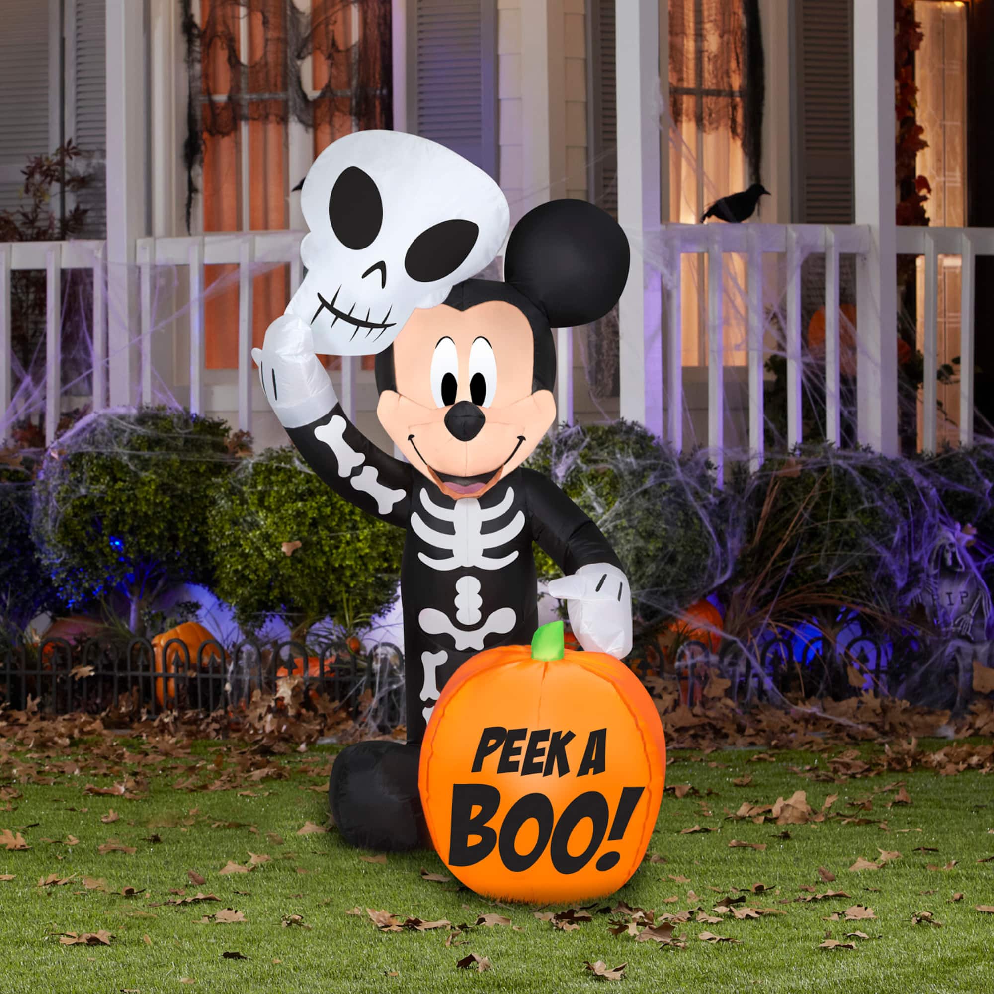 4ft. Airblown® Halloween Inflatable Mickey Mouse in Skeleton Costume with Pumpkin